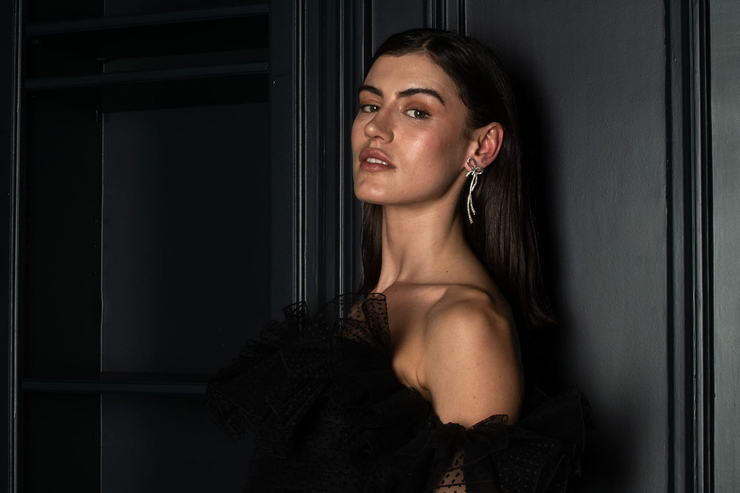 Long Bow Stud Earrings in 18K Gold | Colette Jewelry