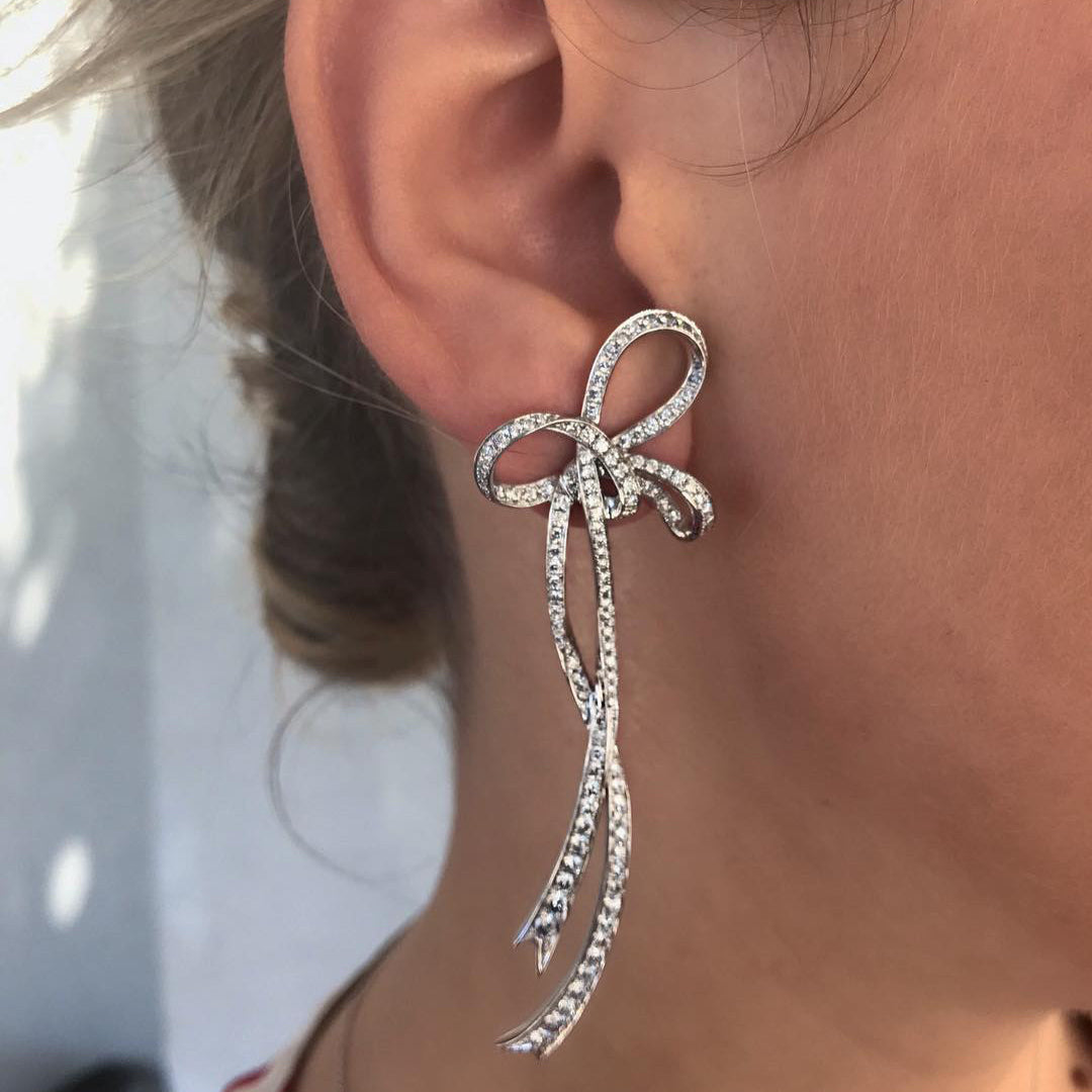 Long Bow Stud Earrings in 18K Gold | Colette Jewelry